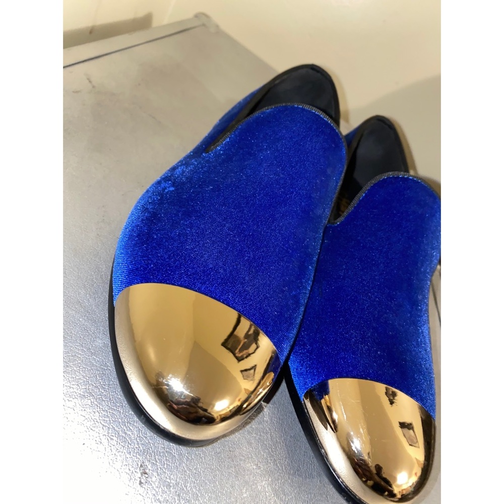 Suede material, men’s blue and gold dress shoes.